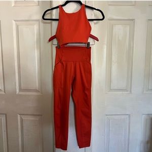 Girlfriend Collective set in XXS (I believe it's in color: Tart)